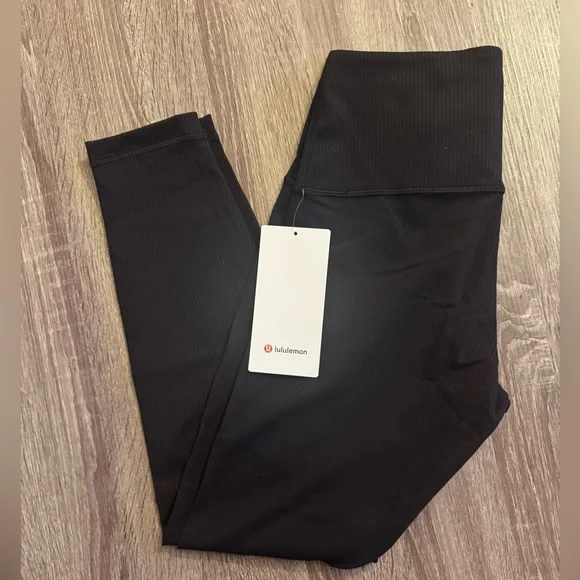 New with tags Lululemon Wunder Train High-Rise Ribbed
Tight 25", Black. Size 6. - Picture 14 of 15